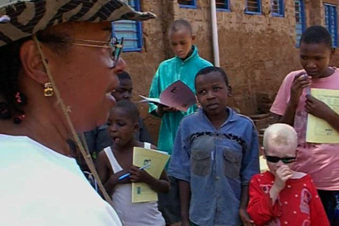 picture of Dr. Bath promises to help children at Mwereni in Tanzania